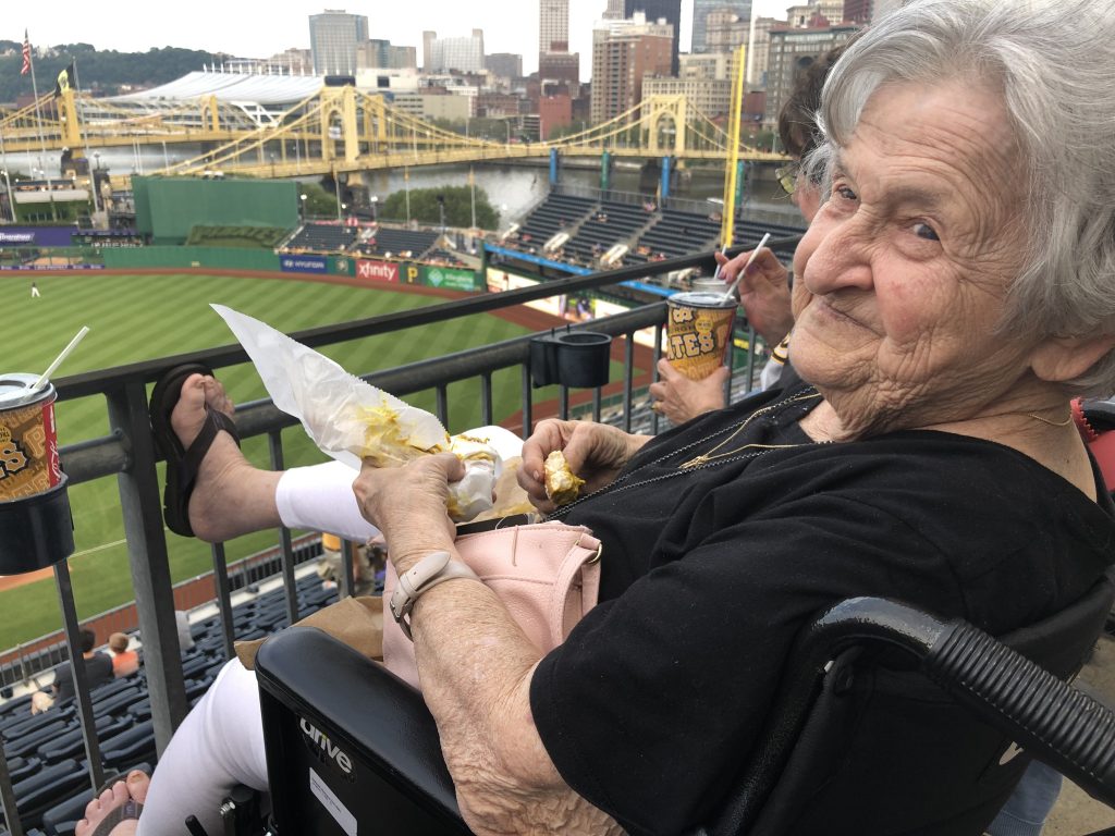 RP Home resident enjoying a soft pretzel at the Pittsburgh Pirate's game